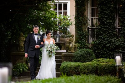 Wedding Ceremony in the garden at Lord Thompson Manor