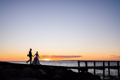 sunset wedding photos at west chop club's beach