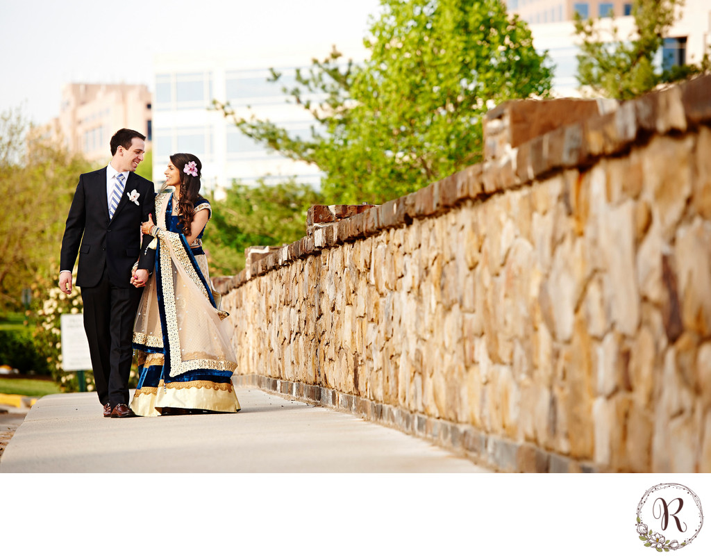 Bride and Groom Walking on the Bridge by Westin Dulles