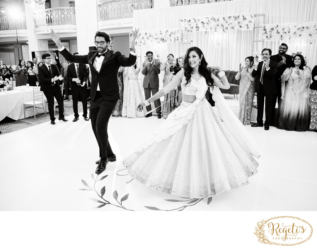 Bride and Groom dancing at their Indian wedding reception