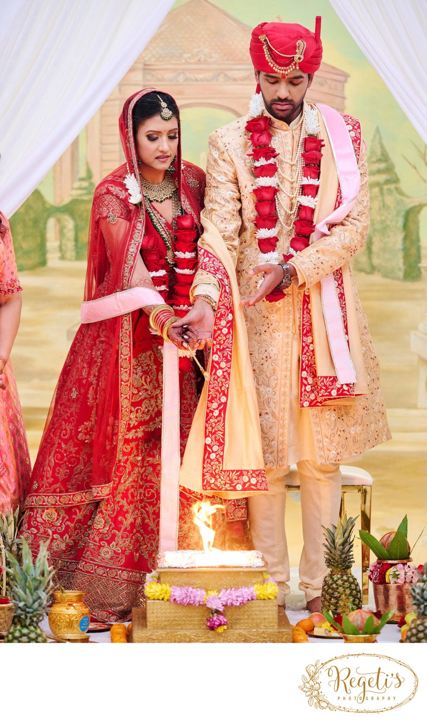 Bride and Groom Performing Hindu Rituals