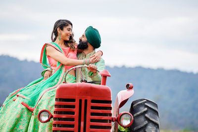 Punjabi Engagement Photo Session on a tractor located on the outskirts of  Northern Virginia