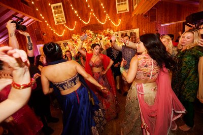 Wedding sangeet event celebrations and ceremonies at the Castle Hill Cider in Keswick, Virginia