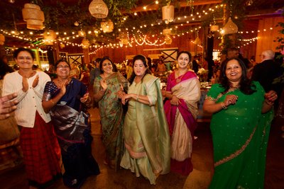 Wedding sangeet event celebrations and ceremonies at the Castle Hill Cider in Keswick, Virginia