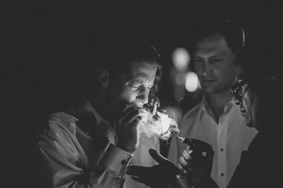 Lighting a Cigar at Querencia in Los Cabos, Mexico