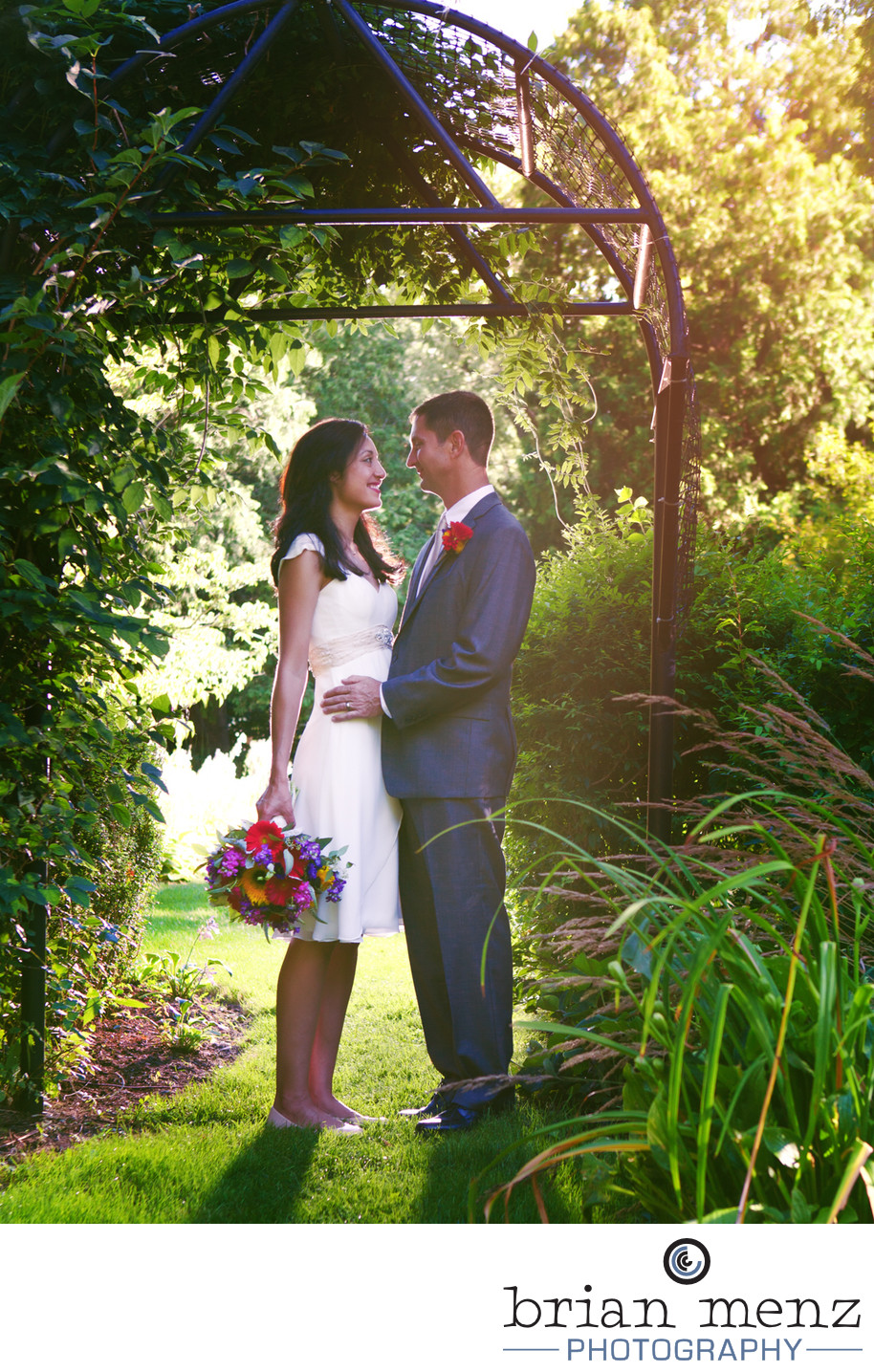 bride-kissing-groom-michigan-wedding-photography