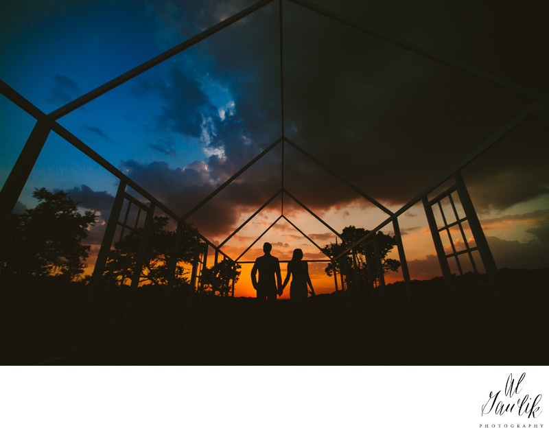 Dripping Springs Wedding Venue sunset frames newlyweds Dripping Springs Wedding Venue sunset frames newlyweds