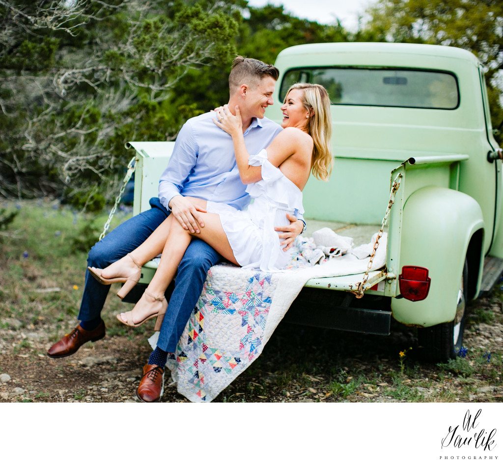 Engagement photo on classic car