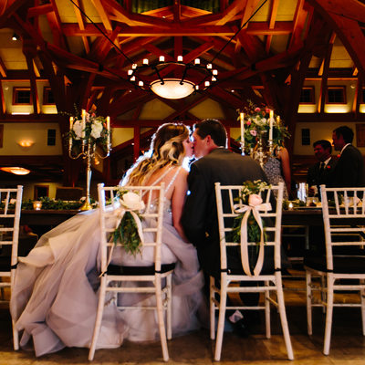 Texas Wedding Photographer Sneaks Photo Behind couple