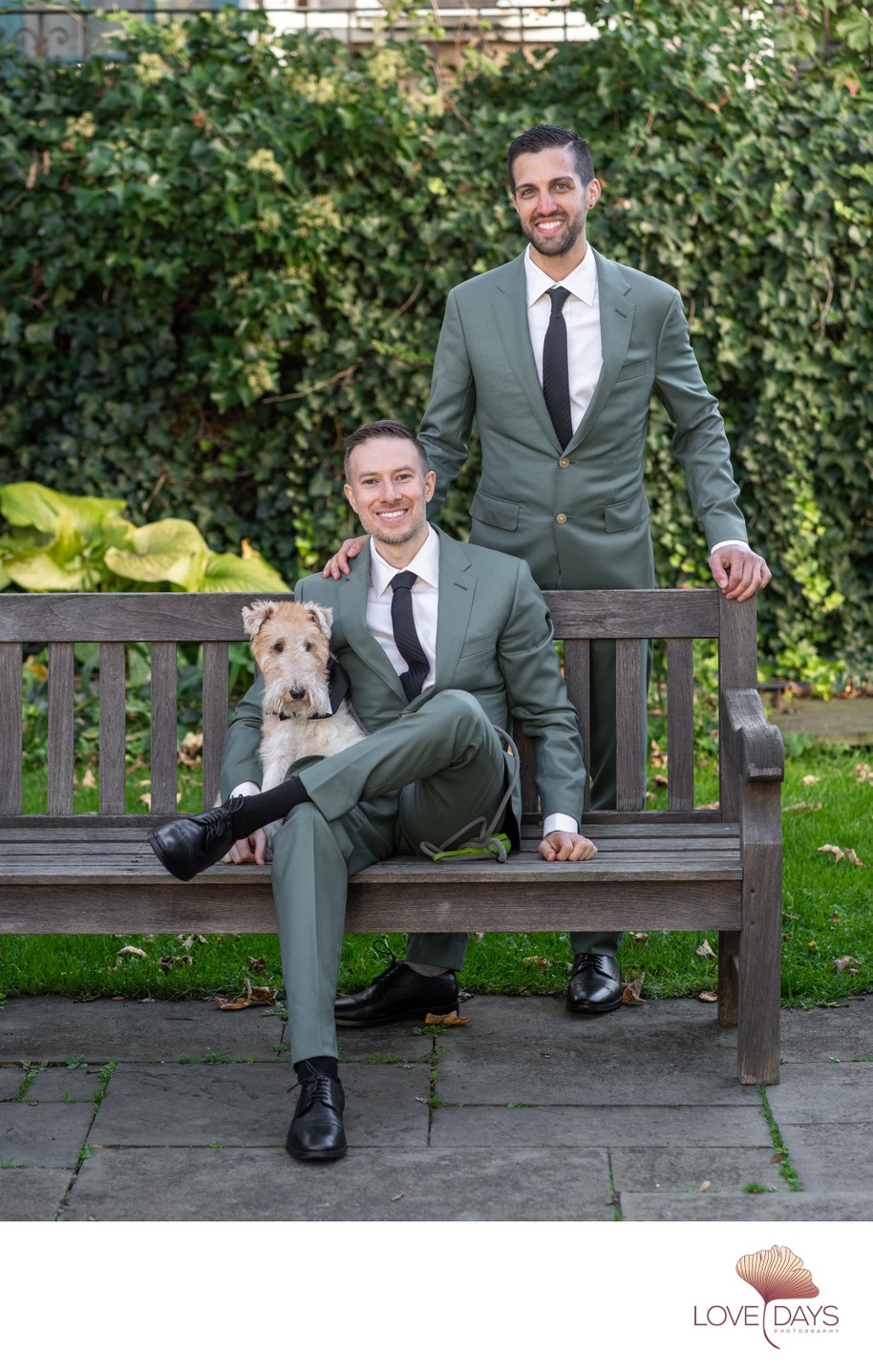 Two suits and a dog. Two Provincetown Grooms