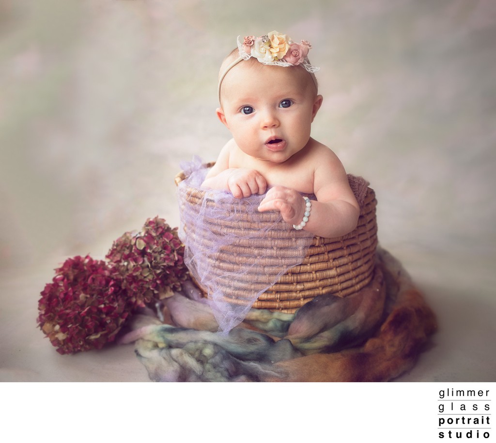 Portrait of Two Month Old Baby in a Basket