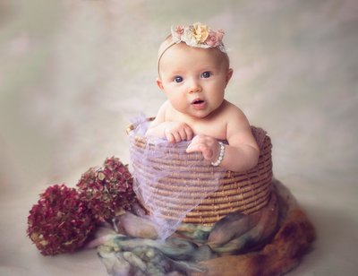 Portrait of Two Month Old Baby in a Basket