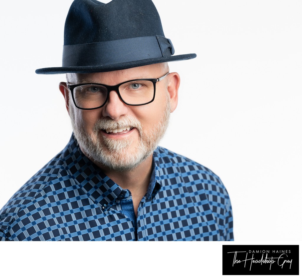 Business Branding Headshot of gentleman in a hat