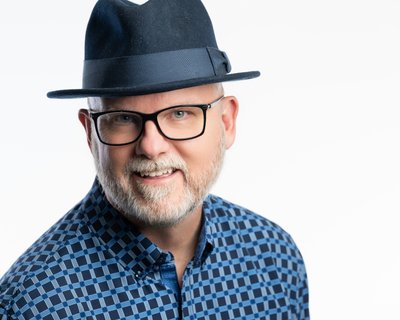 Business Branding Headshot of gentleman in a hat