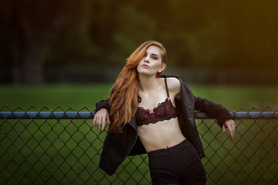 Girl in bra and leather jacket