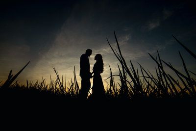 Engagement photo silhouette clouds