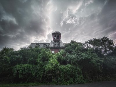 Abandoned Building with dramatic sky 