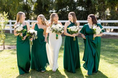 Bridesmaids walking together at Rancho Guejito Vineyard