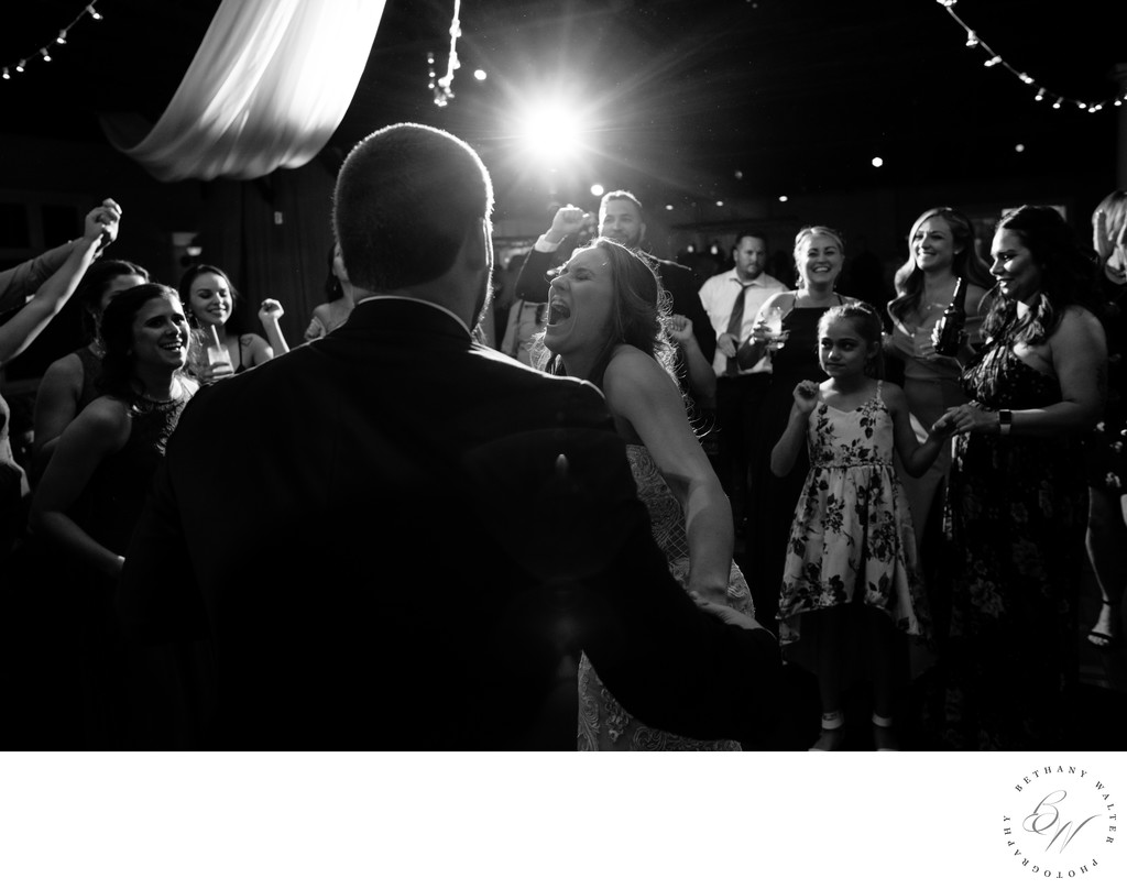 Bride and Groom Dancing at their White Room Reception