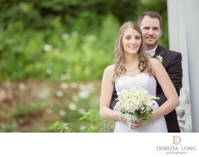 Bride Groom posing traditional outdoor wedding portrait