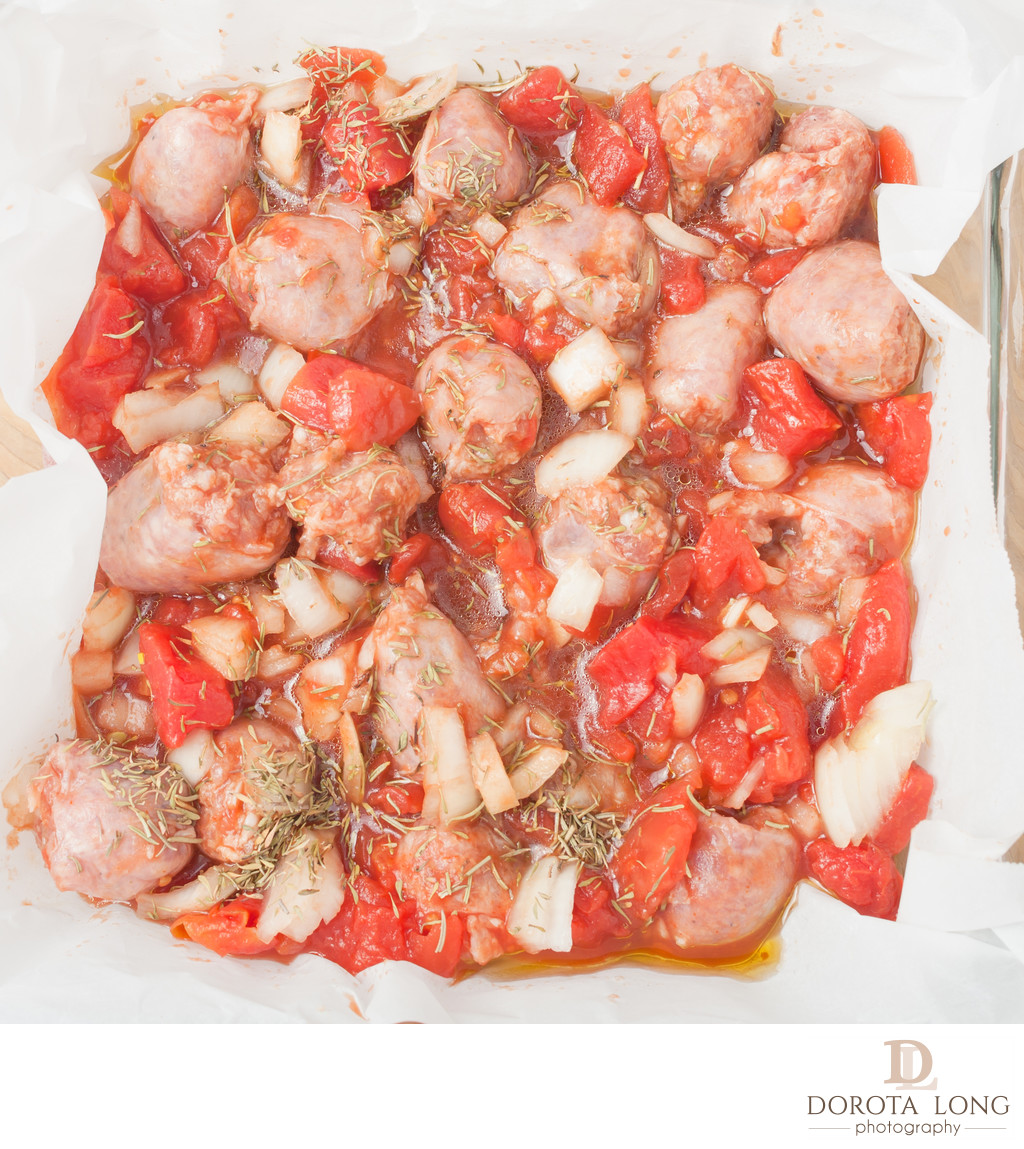 uncooked-chopped-sausages-in-baking-dish