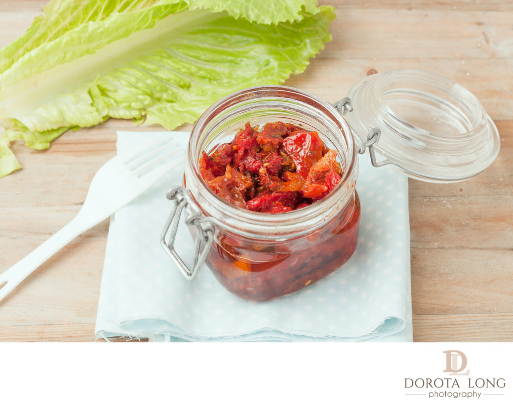 sun dried tomatoes in glass jar