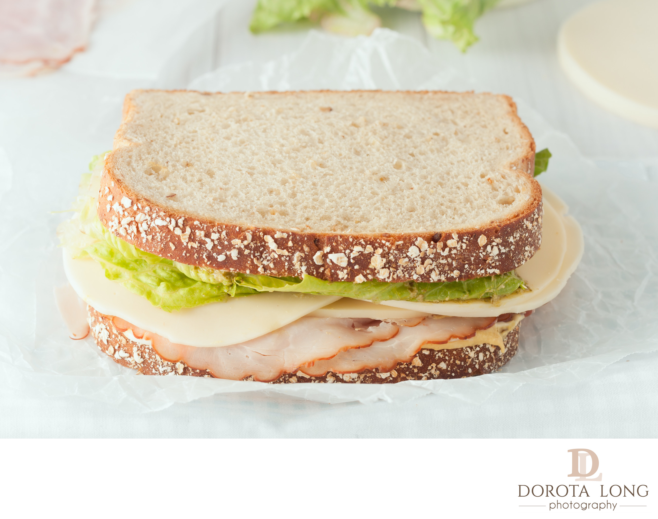 sandwich with ham, cheese and lettuce