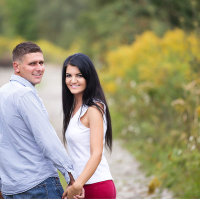 black and white image of a couple looking at each other