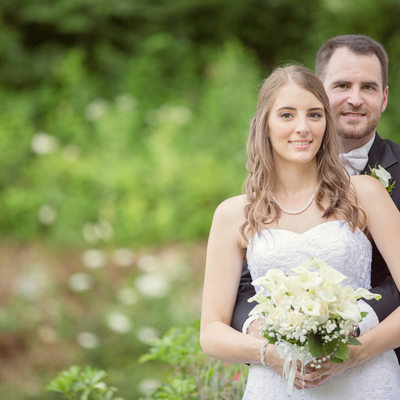 Bride Groom posing traditional outdoor wedding portrait