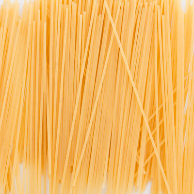 isolated uncoked spagetti