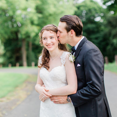Groom kissing bride in Danbury: Wedding posing 