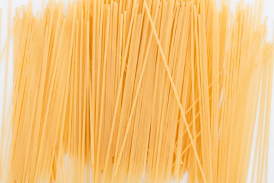 isolated uncoked spagetti