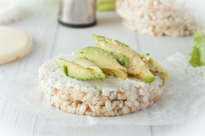 rice cake with cream cheese and avocado