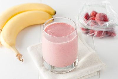 homemade banana and frozen strawberry smoothie