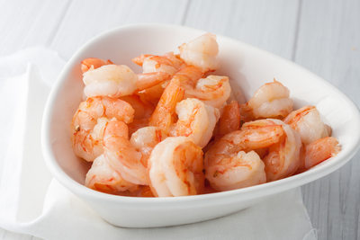 fresh cooked shrimp in white bowl