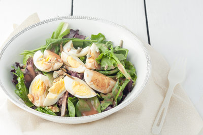 fresh green salad with boiled eggs