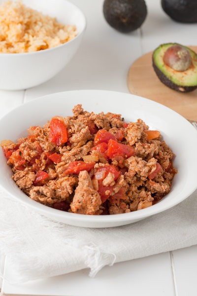 fried ground meat with tomatoes ready for tacos