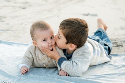 Sibling photo on the beach