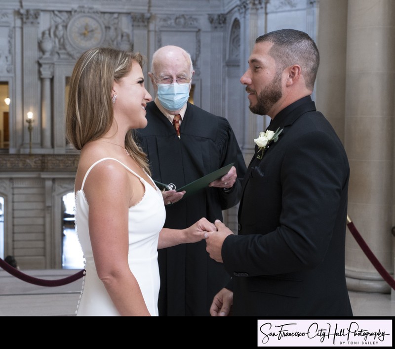 SF city hall wedding ceremony with bride and groom