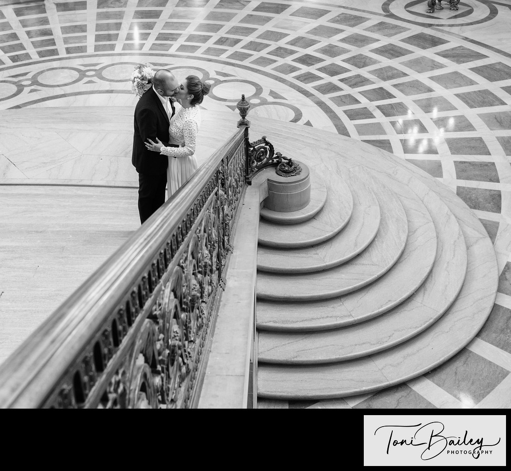 Grand Staircase railing black and white kiss photo
