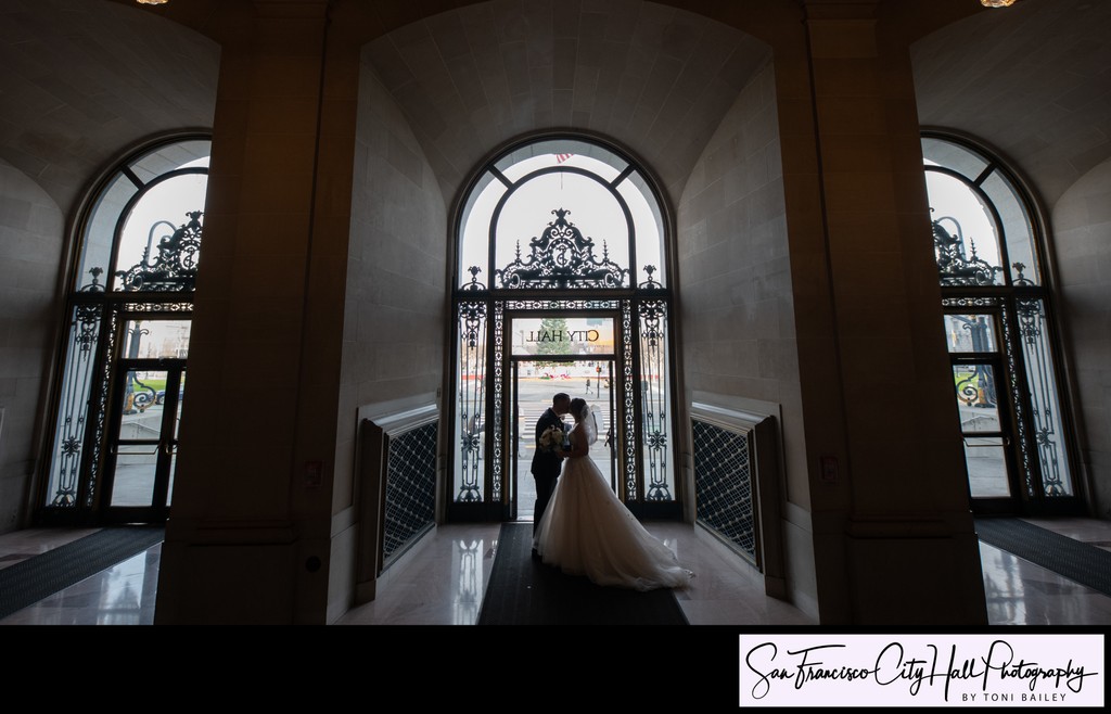 Triple entrance wedding photo at San Francisco city hall