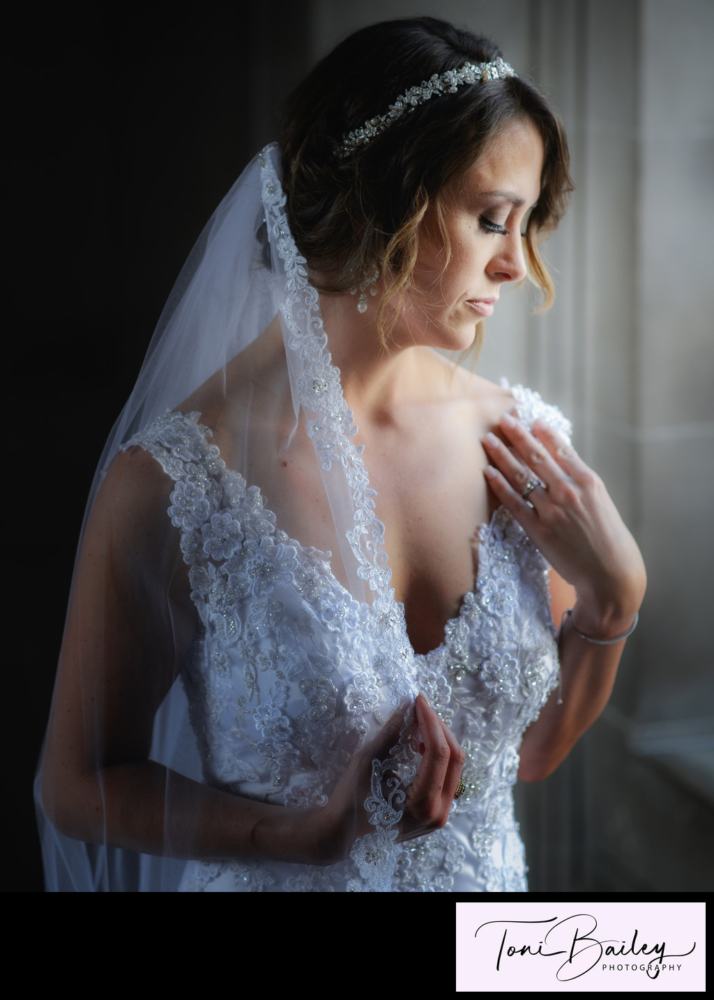 Beautiful bride showing her ring