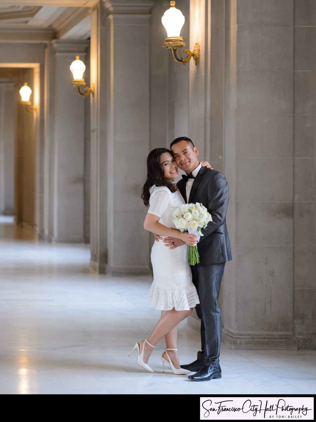 Cute Bride and Groom Elopement Photography on 3rd floor City Hall
