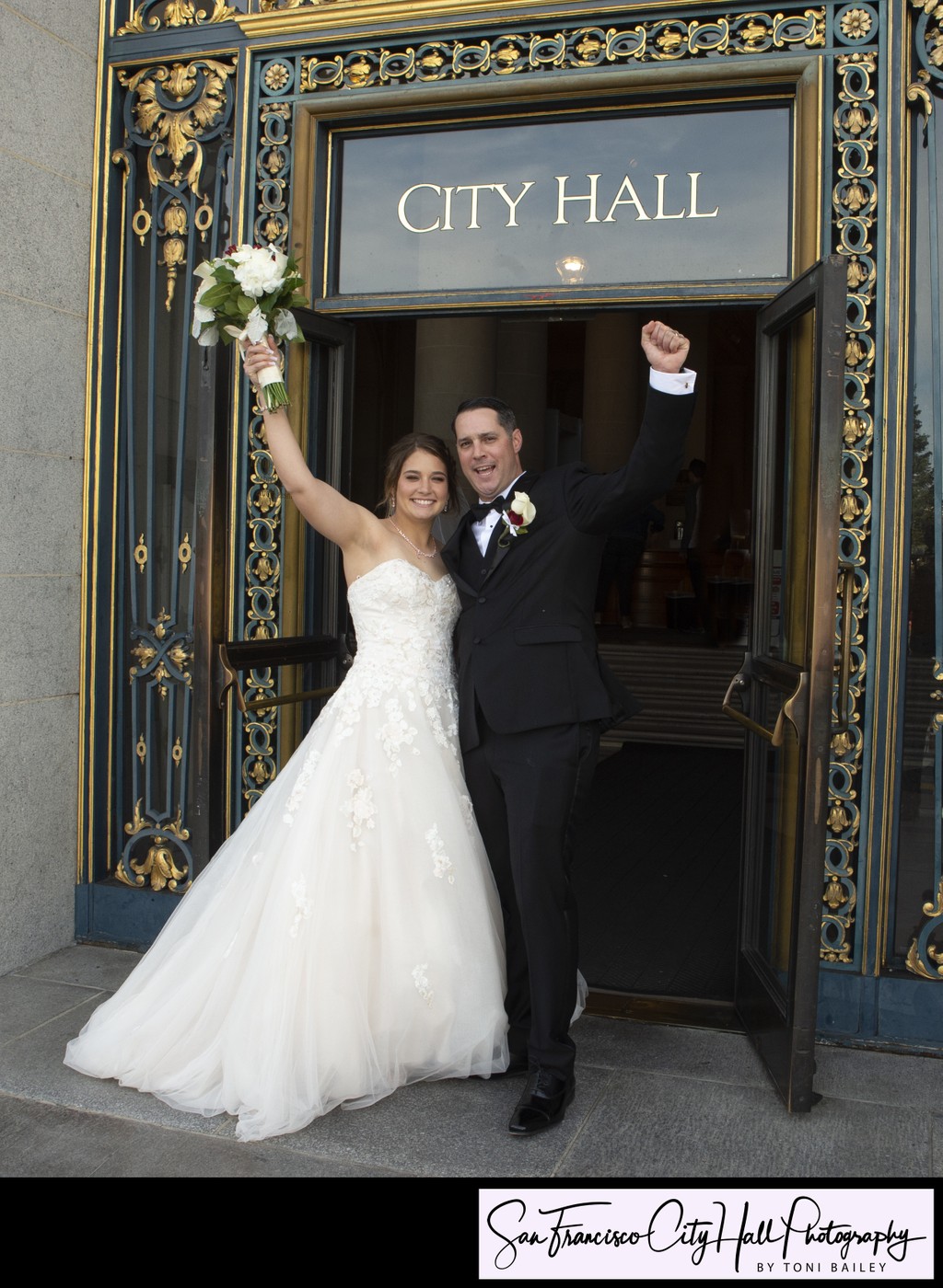 Newlyweds celebrate their recent marriage at San Francisco city hall - photographer