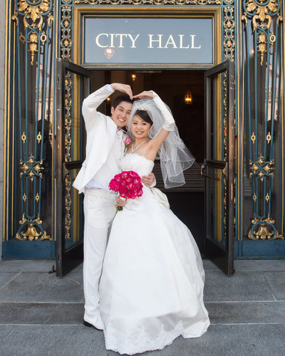 San Francisco City Hall Asian Wedding couple outside of the building
