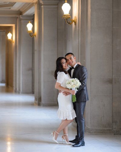 Cute Bride and Groom Elopement Photography on 3rd floor City Hall