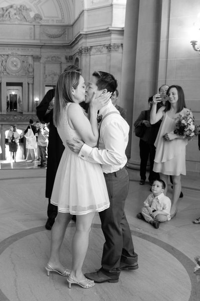 same sex wedding celebration kiss