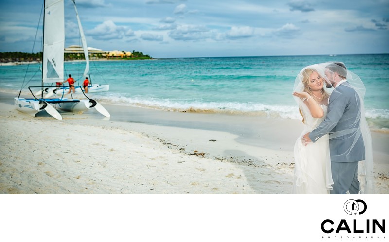 Newlyweds on the Beach at Barcelo Maya Palace Deluxe Wedding