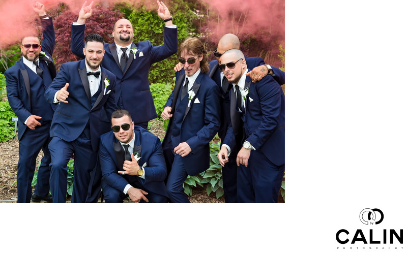 Groomsmen Have Fun With Red Smoke