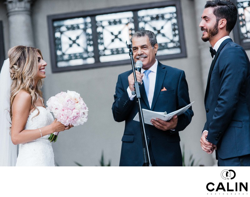 Couple and Officiant Laughing